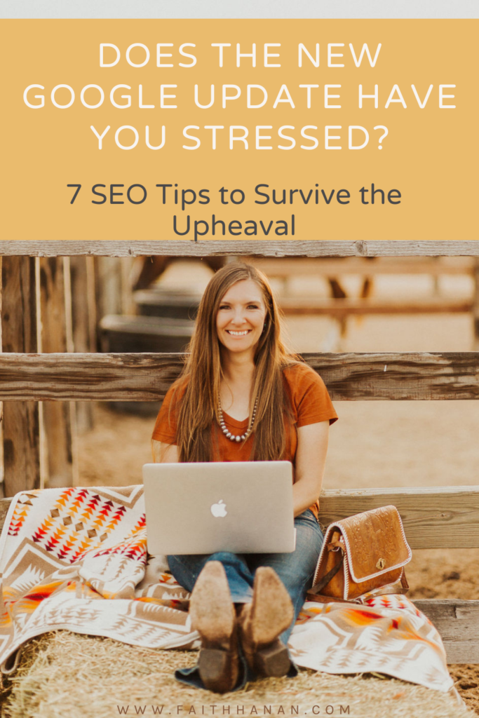 7-seo-tips-survive-the-upheaval-of-the-google-core-updates-with-smiling-woman-working-on-laptop-sitting-on-hay-bales